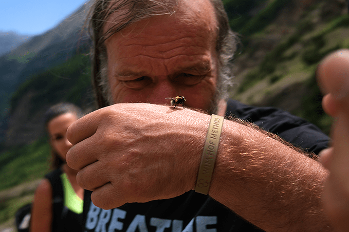 Wim Hof with a bee on his hand